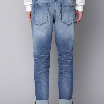 Men Blue Tapered Fit Heavy Fade Stretchable Jeans